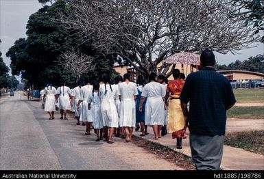 Tonga - group of Pacific Islander women wearing white