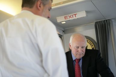 Vice President Cheney Talks with David Addington Aboard Air Force Two En Route to Guam