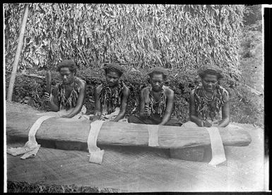 Four women beating tapa cloth, Fiji, ca. 1920 / E.W. Searle