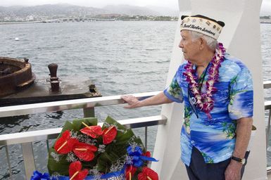 Mario Jobbe a Pearl Harbor survivor takes a moment on Dec. 7, 2006, in remembrance of the Attack on Pearl Harbor, Hawaii. (U.S. Navy PHOTO by Mass Communication SPECIALIST 2nd Class Ben A. Gonzales) (Released)