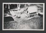 Display of model of a building, bowl, tray, and basket, Papua New Guinea, c1945 to 1952?