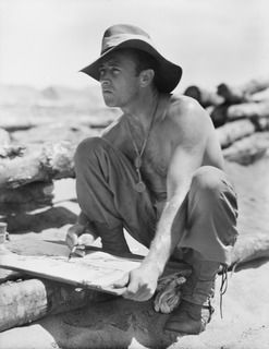 Anamo Area, New Guinea. 1944-11-24. Informal portrait of bare-chested official war artist SX7174 Captain Ivor H. T. Hele sketching bridging activities on lines of communication from Aitape to ..