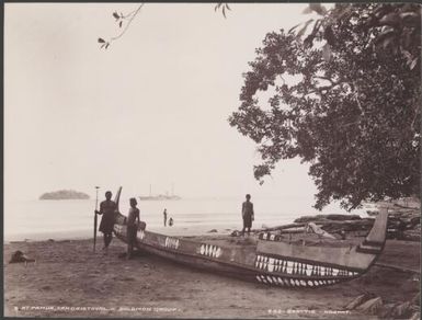 Men with canoe on a beach at Pamua, Southern Cross in background, San Cristoval, Solomon Islands, 1906 / J.W. Beattie