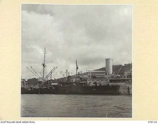 FINNISCHHAFEN, NEW GUINEA. 1944-11-20. THE ROYAL AUSTRALIAN NAVY VESSEL, HMAS "BENDIGO" REFUELLING FROM THE UNITED STATES NAVY TANKER, USS "VICTORIA"