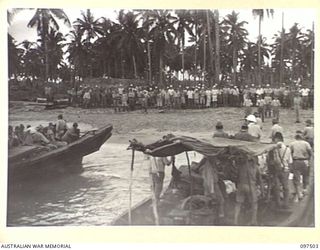 KAHILI, BOUGAINVILLE. 1945-10-01. JAPANESE TROOPS LINED UP ON KAHILI BEACH TO FAREWELL THEIR FORMER COMMANDING OFFICERS. HIGH RANKING JAPANESE ARMY AND NAVAL OFFICERS ON BOUGAINVILLE WERE ESCORTED ..