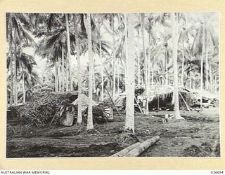 MILNE BAY, PAPUA. 1942-09. CAMOUFLAGED WORKSHOPS OF 101 INDEPENDENT BRIGADE GROUP WORKSHOPS IN THE MILNE BAY AREA