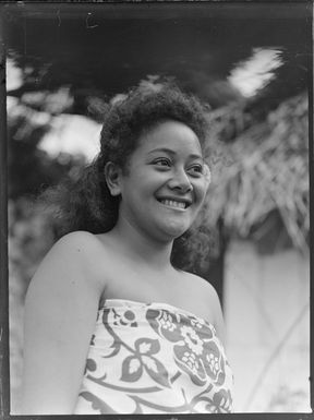 Portrait of unidentified local woman in number 1 laplap top, Rarotonga, Cook Islands