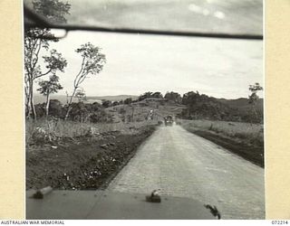 GUSIKA, NEW GUINEA. 1944-04-09. THE NEW ROAD BETWEEN FINSCHHAFEN AND KILIGIA VIEWED FROM PINO HILL TOWARDS NORTH HILL