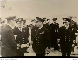 Scapa Flow, Scotland. 1943-08-16. King George VI on board HMS Shropshire before the cruiser sailed for the Pacific. The British Government offered, and the Australian Government accepted, the ..