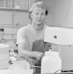 Michael Edward Huber, a Scripps Institution of Oceanography graduate student, conducts experiments in his lab. His 1983 Thesis (Ph.D.) was titled: Ethology and population biology of Trapezia, a xanthid crab symbiotic with reef corals : with special reference to territoriality and speciation. In 1988, Huber moved to the University of Papua New Guinea to study and dive on some of the world's most spectacular coral reefs. He served as Head of the University's marine research station on Motupore Island, and became increasingly interested in marine environmental science, especially with regard to reefs, mangroves, seagrass beds, and other tropical systems. This interest continued to grow during four years as Director of a marine research station on the Great Barrier Reef. November 3, 1980