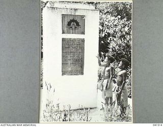 MILNE BAY, PAPUA. 1949-08. MEMORIAL ERECTED ON TURNBULL AIRSTRIP. THE INSCRIPTION READS:- "IN MEMORY OF THE OFFICERS, N.C.O.S. AND MEN OF THE 7TH AND 8TH. AUSTRALIAN INFANTRY BRIGADES WHO GAVE ..