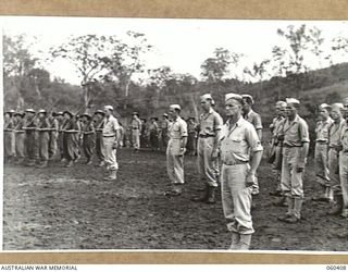 SOGERI, NEW GUINEA. 1943-11-20. UNITED STATES ARMY INSTRUCTORS AT THE SCHOOL OF SIGNALS, NEW GUINEA FORCE, ON THE DAILY PARADE