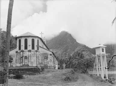 [View of a church and mountains]