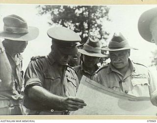 BOUGAINVILLE, SOLOMON ISLANDS. 1945-03-26. VX1 GENERAL SIR THOMAS BLAMEY, GBE, KCB, CMG, DSO, ED, COMMANDER- IN- CHIEF, ALLIED LAND FORCES, SOUTH WEST PACIFIC AREA (2), WITH TX2002 BRIGADIER J. ..