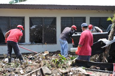 Earthquake ^ Tsunami - Leone, American Samoa, October 2, 2009 -- Volunteers assist with the clean up of debris after the tsunami in American Samoa. The containment of hazardous waste is an important step in the removal of debris after a tsunami disaster.