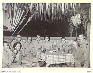 LAE AREA, NEW GUINEA. 1945-06-02. MEMBERS OF THE MESS AND AUSTRALIAN WOMEN'S ARMY SERVICE GUESTS WHO ATTENDED A DANCE AT THE SERGEANTS' MESS, HEADQUARTERS ANGAU, NORTHERN REGION. IDENTIFIED ..