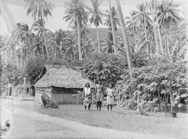 [Group portrait of three people]