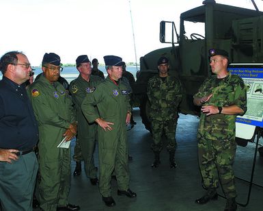 US AIr Force Lieutenant Colonel Fred Cheney, 25th Air Support Operations Squadron, Hickam Air Force Base, Hawaii, briefs members of the Air Force Board on planned future procurements and projected needs