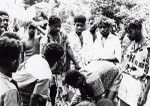 Group of young boys preparing a meal