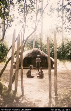 People in front of house