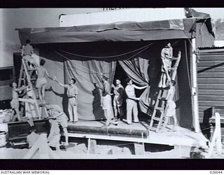 PAPUA, NEW GUINEA, 1942-07. A CONCERT PARTY WAS FORMED FROM AMONG THE TROOPS OF AN AUSTRALIAN INFANTRY BRIGADE SERVING IN THE AREA FOR THE ENTERTAINMENT OF AUSTRALIAN AND AMERICAN TROOPS IN PAPUA, ..