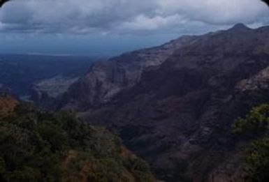 [Landscape of eroding cliffs and valley of Waimea Canyon, United States]