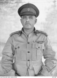 LAE, NEW GUINEA. 1945-10-04. BRIGADIER R.H. NIMMO, DEPUTY ASSISTANT AND QUARTERMASTER GENERAL HEADQUARTERS FIRST ARMY