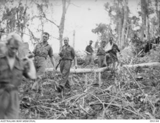 WEWAK AREA, NEW GUINEA, 1945-06-15. SOME OF B COMPANY, 2/8 INFANTRY BATTALION TROOPS LEAVING FOR THE LONG TREK BACK TO HEADQUARTERS. IDENTIFIED PERSONNEL ARE:- L-CPL J. LAIDLAW (1); CPL. ALLEN (2); ..