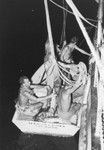 Willard N. Bascom (left) and others in skiff returning from Keppel and Niuatoputapu Islands, Tonga