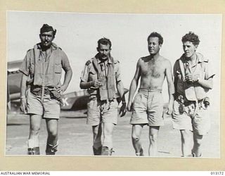 1942-09-03. FOUR AUSTRALIAN FIGHTER PILOTS NOW OPERATING IN NEW GUINEA. AMONG THEM IS THEIR SQUADRON LEADER WHO, BEFORE RETURNING TO AUSTRALIA, HAS ALREADY ESTABLISHED AN ENVIABLE REPUTATION AS A ..