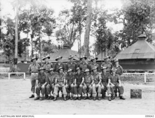 Group portrait of members of 11 Platoon, B Company, 27 Australian Infantry Battalion (AIF). Identified left to right, back row: SX24001 Private (Pte) W J McAllister; NX194564 Pte J O Barry; S20015 ..