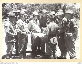 BONIS PENINSULA, BOUGAINVILLE. 1945-09-15. DURING SURRENDER DISCUSSIONS AT JAPANESE NAVAL HEADQUARTERS, BONIS PENINSULA, THE AUSTRALIAN SURRENDER PARTY, MEMBERS OF HEADQUARTERS 2 CORPS, MOVED ..