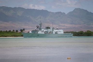 Port bow view of the Canadian frigate HMCS WINNIPEG (FFH 338) departing Pearl Harbor to take part in Operation RIMPAC 2000