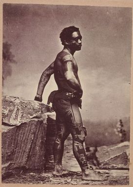 Tattooed native warrior of the Marquesas Islands. From the album: Tahiti, Samoa and New Zealand scenes