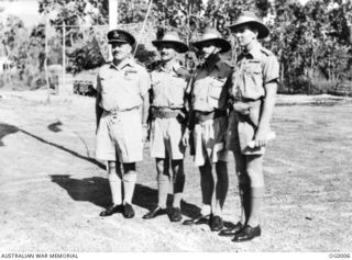 Portrait of four recipients of United States of America decorations for distinguished services in the Papuan campaign. Left to right: 0326 Group Captain (later Air Commodore) William Henry Garing ..