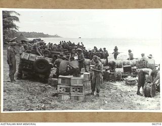 SIALUM, NEW GUINEA. 1944-01-05. THE SUPPLY DEPOT WHICH IS BEING ESTABLISHED IN PREPARATION FOR THE 9TH AUSTRALIAN DIVISION PUSH ON THE JAPANESE POSITIONS AT SIO