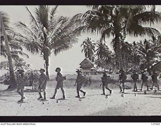 PONGANI, NEW GUINEA. 1942-10.25. MEMBERS OF 2/6TH AUSTRALIAN INDEPENDENT COMPANY, WHO HAD LEFT WANIGELA ON 1942-10-15, ARRIVING AFTER A VERY HARD MARCH, DUE MAINLY TO SWAMPY CONDITIONS AND, AFTER ..