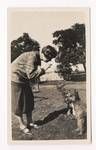 Woman training a dog, c1920 to ?