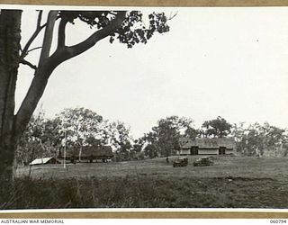 POM POM VALLEY, NEW GUINEA. 1943-11-27. VIEW OF THEADQUARTERS, 18TH AUSTRALIAN INFANTRY BRIGADE LOOKING ACROSS THE PARADE GROUND