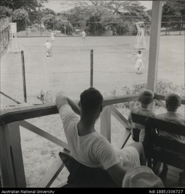 Playing tennis