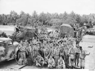 KIRIWINA, TROBRIAND ISLANDS, PAPUA. C. 1943-11-30. AN INFORMAL GROUP PORTRAIT OF MEMBERS OF NO. 6 MOBILE WORKS SQUADRON RAAF TAKEN ON THE DECK OF THE SHIP JUST BEFORE DEPARTURE FROM KIRIWINA TO ..