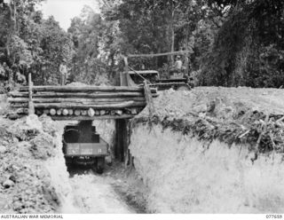 JACQUINOT BAY, NEW BRITAIN. 1944-12-11. 1. A "CHINAMAN" GRAVEL PIT OPERATED BY THE SAPPERS OF THE 13TH FIELD COMPANY