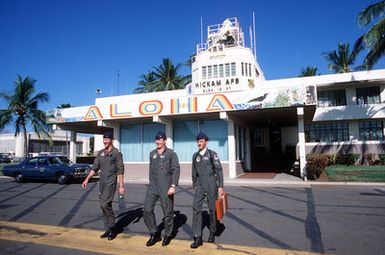 The "aloha" sign painted on the base operations building greets those arriving and bids farewell to those departing the island