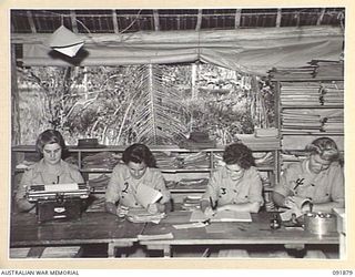 LAE, NEW GUINEA, 1945-05-16. AUSTRALIAN WOMEN'S ARMY SERVICE PERSONNEL WORKING WITH ADMINISTRATION BRANCH AND REGISTRY, HEADQUARTERS LAE BASE SUB-AREA. THEY ARE TAKING OVER THEIR NEW DUTIES IN ..
