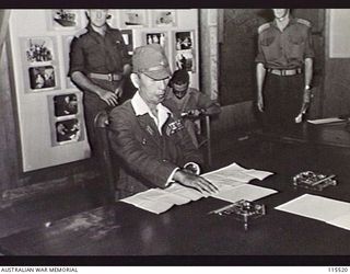 TOROKINA, BOUGAINVILLE. 1945-09-08. LIEUTENANT-GENERAL (LT-GEN) S. G. SAVIGE, GENERAL OFFICER COMMANDING 2 CORPS, ACCEPTED THE SURRENDER OF ALL JAPANESE FORCES ON BOUGAINVILLE FROM LT-GEN M. KANDA, ..