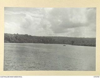 JACQUINOT BAY, NEW BRITAIN. 1944-11-04. THE ENTRANCE TO THE RIVER FROM THE BAY SHOWING AUSTRALIAN VESSELS AT ANCHOR