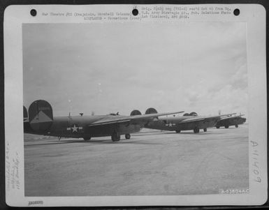 Consolidated B-24 Liberators Of The 11Th Bomb Group, Warming Up Motors Prior To Take Off On Mission From Kwajalein, Marshall Islands, July 1944. (U.S. Air Force Number A63804AC)