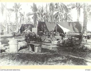 ALEXISHAFEN, NEW GUINEA. 1944-05-26. THE SIGNAL OFFICE AT HEADQUARTERS 8TH INFANTRY BRIGADE