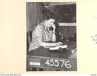 LAE, NEW GUINEA. 1945-05-15. CAPTAIN J. CRAWFORD, ONE OF TWO ADJUTANT ADMINISTRATIVE OFFICERS TO THE DEPUTY DIRECTOR OF MECHANICAL ENGINEERING, HEADQUARTERS FIRST ARMY. A FEW DAYS AFTER THEIR ..