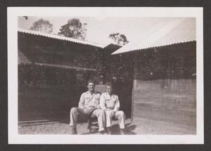 [Henry Cates, Jr., and Jim Counts Sitting in Front of Shed]